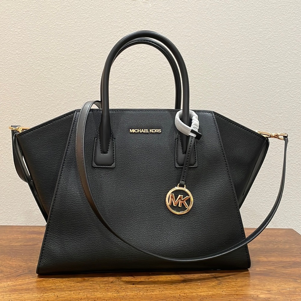 Michael Kors black satchel handbag.